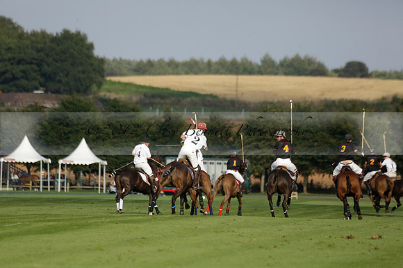Pluma Negra (white) v Shoreline (black) in the Brecknock Cup Subsidiary final polo match played on Sunday 25 August 2013 at Cowdray Park Polo Club on Ambersham 1. 2013.10.12 www.polopictures.co.uk