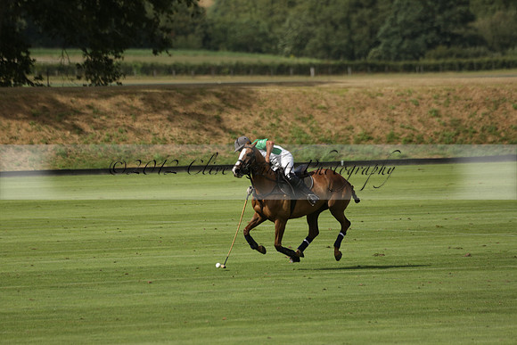 Jaeger Le Coultre (black)  v Wairakei Pastoral (white) in a Jaeger Le Coultre Holden White Cup polo match played on 29 July 2013 at Cowdray Park Polo Club on Brooksfieldwww.polopictures.co.uk