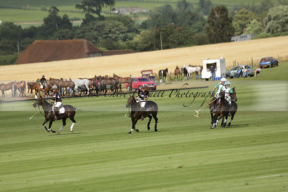 Jaeger Le Coultre (black)  v Wairakei Pastoral (white) in a Jaeger Le Coultre Holden White Cup polo match played on 29 July 2013 at Cowdray Park Polo Club on Brooksfieldwww.polopictures.co.uk