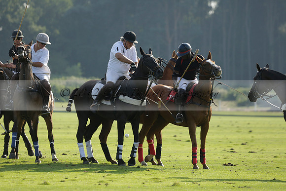 Pluma Negra (white) v Shoreline (black) in the Brecknock Cup Subsidiary final polo match played on Sunday 25 August 2013 at Cowdray Park Polo Club on Ambersham 1. 2013.10.12 www.polopictures.co.uk