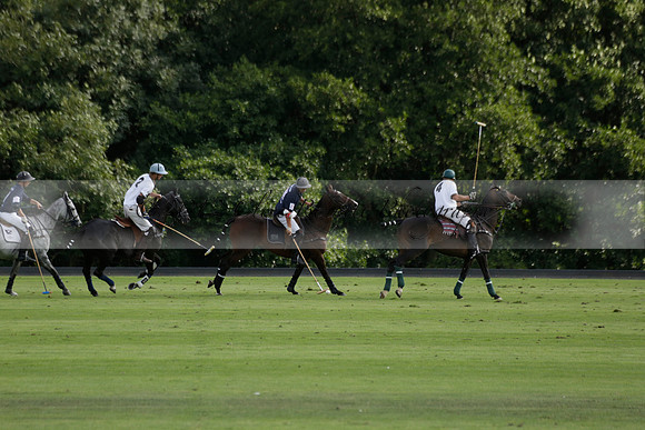Pandas (white) v Home Farm (navy) in a Park House West Sussex Cup Polo match on Brooksfield at Cowdray Park Polo Club on Friday 30 August 2013. 2013.08.30 www.polopictures.co.uk