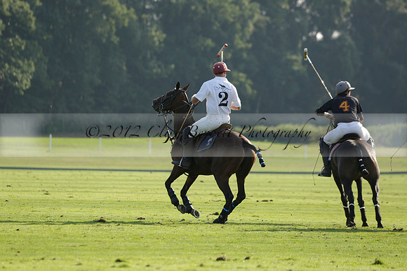 Pluma Negra (white) v Shoreline (black) in the Brecknock Cup Subsidiary final polo match played on Sunday 25 August 2013 at Cowdray Park Polo Club on Ambersham 1. 2013.10.12 www.polopictures.co.uk