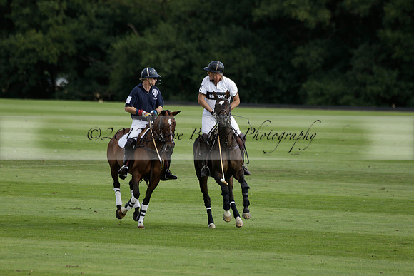 Pandas (white) v Home Farm (navy) in a Park House West Sussex Cup Polo match on Brooksfield at Cowdray Park Polo Club on Friday 30 August 2013. 2013.08.30 www.polopictures.co.uk