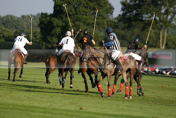 Pluma Negra (white) v Shoreline (black) in the Brecknock Cup Subsidiary final polo match played on Sunday 25 August 2013 at Cowdray Park Polo Club on Ambersham 1. 2013.10.12 www.polopictures.co.uk