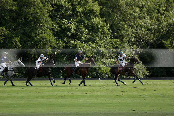 Pandas (white) v Home Farm (navy) in a Park House West Sussex Cup Polo match on Brooksfield at Cowdray Park Polo Club on Friday 30 August 2013. 2013.08.30 www.polopictures.co.uk