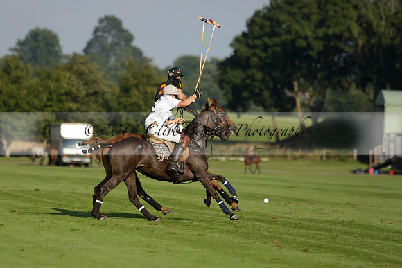 Pluma Negra (white) v Shoreline (black) in the Brecknock Cup Subsidiary final polo match played on Sunday 25 August 2013 at Cowdray Park Polo Club on Ambersham 1. 2013.10.12 www.polopictures.co.uk