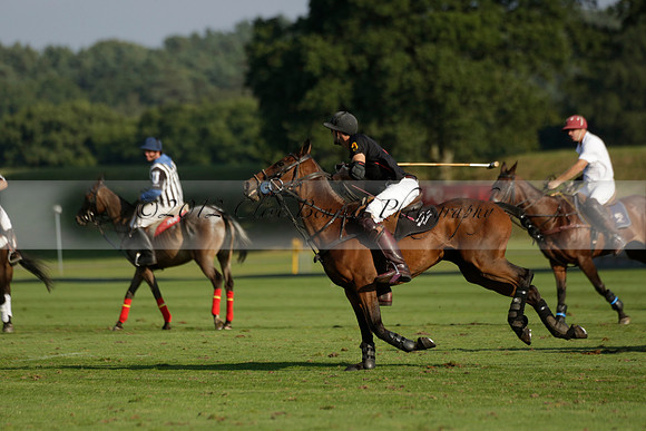 Pluma Negra (white) v Shoreline (black) in the Brecknock Cup Subsidiary final polo match played on Sunday 25 August 2013 at Cowdray Park Polo Club on Ambersham 1. 2013.10.12 www.polopictures.co.uk
