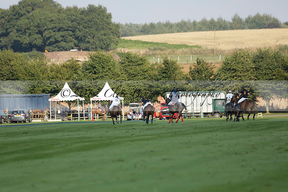 Pluma Negra (white) v Shoreline (black) in the Brecknock Cup Subsidiary final polo match played on Sunday 25 August 2013 at Cowdray Park Polo Club on Ambersham 1. 2013.10.12 www.polopictures.co.uk