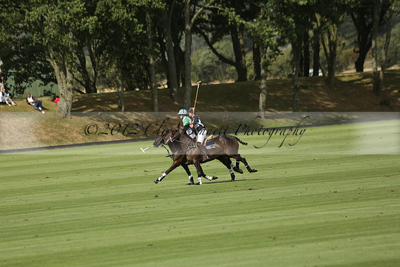 Jaeger Le Coultre (black)  v Wairakei Pastoral (white) in a Jaeger Le Coultre Holden White Cup polo match played on 29 July 2013 at Cowdray Park Polo Club on Brooksfieldwww.polopictures.co.uk