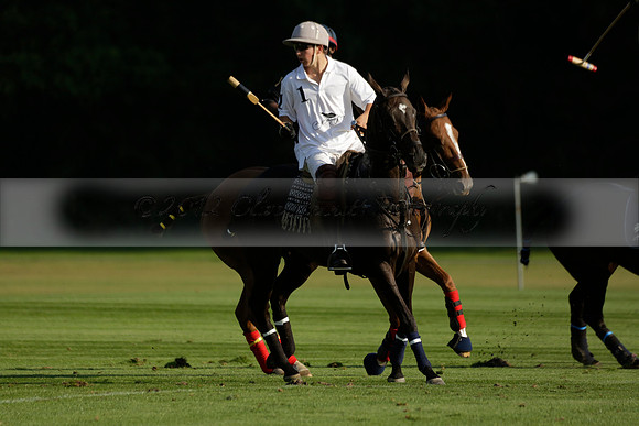 Pluma Negra (white) v Shoreline (black) in the Brecknock Cup Subsidiary final polo match played on Sunday 25 August 2013 at Cowdray Park Polo Club on Ambersham 1. 2013.10.12 www.polopictures.co.uk