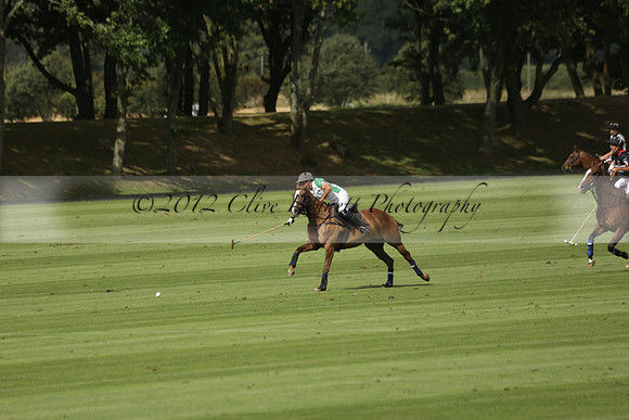 Jaeger Le Coultre (black)  v Wairakei Pastoral (white) in a Jaeger Le Coultre Holden White Cup polo match played on 29 July 2013 at Cowdray Park Polo Club on Brooksfieldwww.polopictures.co.uk