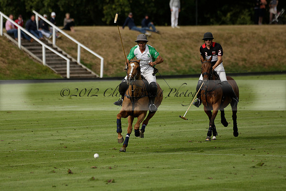 Jaeger Le Coultre (black)  v Wairakei Pastoral (white) in a Jaeger Le Coultre Holden White Cup polo match played on 29 July 2013 at Cowdray Park Polo Club on Brooksfieldwww.polopictures.co.uk