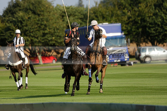 Pluma Negra (white) v Shoreline (black) in the Brecknock Cup Subsidiary final polo match played on Sunday 25 August 2013 at Cowdray Park Polo Club on Ambersham 1. 2013.10.12 www.polopictures.co.uk