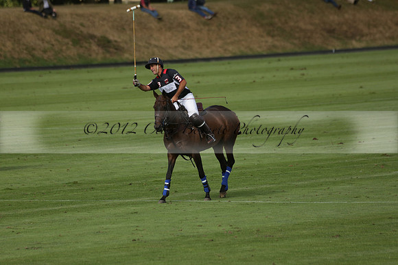 Jaeger Le Coultre (black)  v Wairakei Pastoral (white) in a Jaeger Le Coultre Holden White Cup polo match played on 29 July 2013 at Cowdray Park Polo Club on Brooksfieldwww.polopictures.co.uk