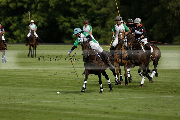 Jaeger Le Coultre (black)  v Wairakei Pastoral (white) in a Jaeger Le Coultre Holden White Cup polo match played on 29 July 2013 at Cowdray Park Polo Club on Brooksfieldwww.polopictures.co.uk
