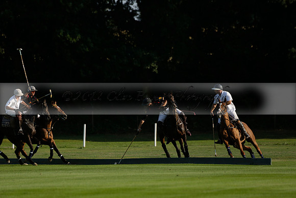Pluma Negra (white) v Shoreline (black) in the Brecknock Cup Subsidiary final polo match played on Sunday 25 August 2013 at Cowdray Park Polo Club on Ambersham 1. 2013.10.12 www.polopictures.co.uk