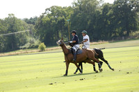 Pandas (white) v Home Farm (navy) in a Park House West Sussex Cup Polo match on Brooksfield at Cowdray Park Polo Club on Friday 30 August 2013. 2013.08.30 www.polopictures.co.uk