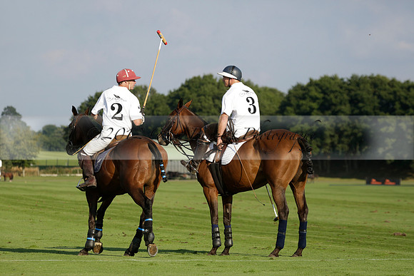Pluma Negra (white) v Shoreline (black) in the Brecknock Cup Subsidiary final polo match played on Sunday 25 August 2013 at Cowdray Park Polo Club on Ambersham 1. 2013.10.12 www.polopictures.co.uk
