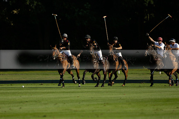 Pluma Negra (white) v Shoreline (black) in the Brecknock Cup Subsidiary final polo match played on Sunday 25 August 2013 at Cowdray Park Polo Club on Ambersham 1. 2013.10.12 www.polopictures.co.uk