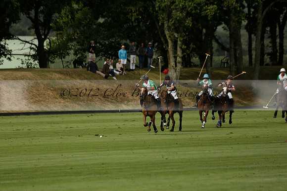 Jaeger Le Coultre (black)  v Wairakei Pastoral (white) in a Jaeger Le Coultre Holden White Cup polo match played on 29 July 2013 at Cowdray Park Polo Club on Brooksfieldwww.polopictures.co.uk