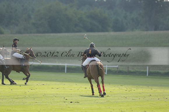 Pluma Negra (white) v Shoreline (black) in the Brecknock Cup Subsidiary final polo match played on Sunday 25 August 2013 at Cowdray Park Polo Club on Ambersham 1. 2013.10.12 www.polopictures.co.uk