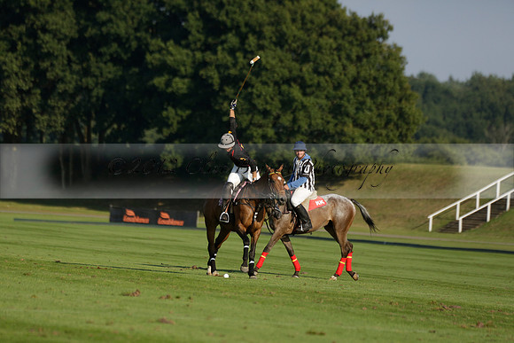 Pluma Negra (white) v Shoreline (black) in the Brecknock Cup Subsidiary final polo match played on Sunday 25 August 2013 at Cowdray Park Polo Club on Ambersham 1. 2013.10.12 www.polopictures.co.uk