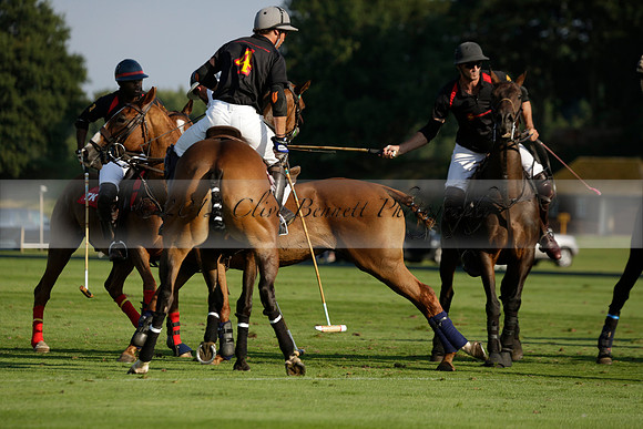 Pluma Negra (white) v Shoreline (black) in the Brecknock Cup Subsidiary final polo match played on Sunday 25 August 2013 at Cowdray Park Polo Club on Ambersham 1. 2013.10.12 www.polopictures.co.uk