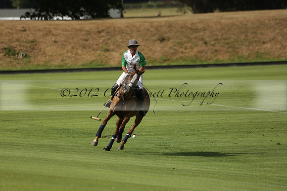 Jaeger Le Coultre (black)  v Wairakei Pastoral (white) in a Jaeger Le Coultre Holden White Cup polo match played on 29 July 2013 at Cowdray Park Polo Club on Brooksfieldwww.polopictures.co.uk