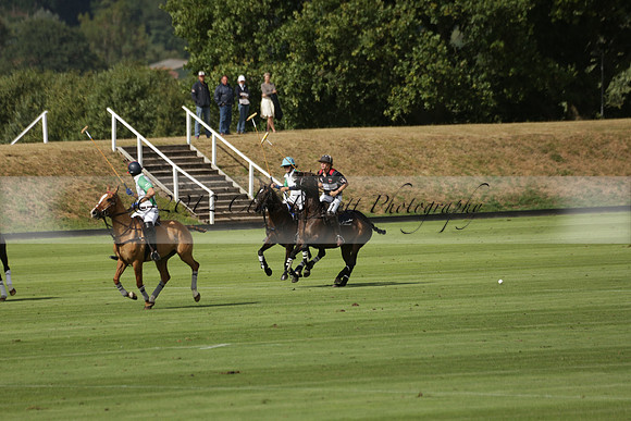 Jaeger Le Coultre (black)  v Wairakei Pastoral (white) in a Jaeger Le Coultre Holden White Cup polo match played on 29 July 2013 at Cowdray Park Polo Club on Brooksfieldwww.polopictures.co.uk