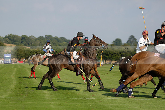 Pluma Negra (white) v Shoreline (black) in the Brecknock Cup Subsidiary final polo match played on Sunday 25 August 2013 at Cowdray Park Polo Club on Ambersham 1. 2013.10.12 www.polopictures.co.uk
