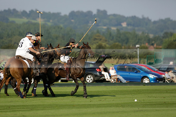 Pluma Negra (white) v Shoreline (black) in the Brecknock Cup Subsidiary final polo match played on Sunday 25 August 2013 at Cowdray Park Polo Club on Ambersham 1. 2013.10.12 www.polopictures.co.uk