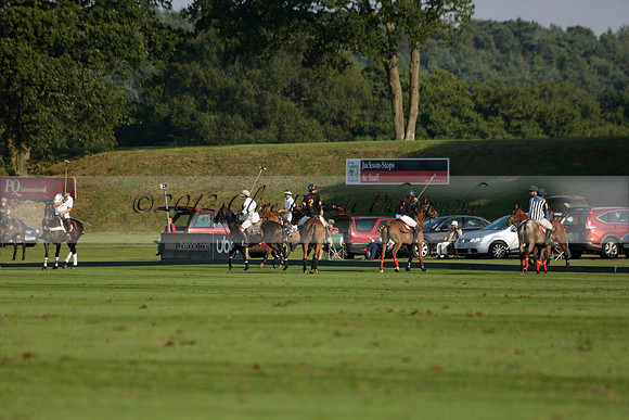 Pluma Negra (white) v Shoreline (black) in the Brecknock Cup Subsidiary final polo match played on Sunday 25 August 2013 at Cowdray Park Polo Club on Ambersham 1. 2013.10.12 www.polopictures.co.uk
