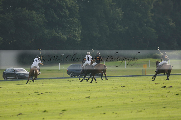 Pluma Negra (white) v Shoreline (black) in the Brecknock Cup Subsidiary final polo match played on Sunday 25 August 2013 at Cowdray Park Polo Club on Ambersham 1. 2013.10.12 www.polopictures.co.uk