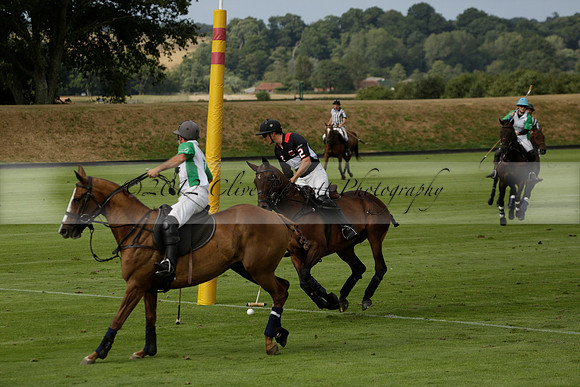 Jaeger Le Coultre (black)  v Wairakei Pastoral (white) in a Jaeger Le Coultre Holden White Cup polo match played on 29 July 2013 at Cowdray Park Polo Club on Brooksfieldwww.polopictures.co.uk