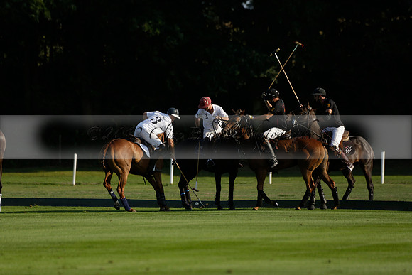 Pluma Negra (white) v Shoreline (black) in the Brecknock Cup Subsidiary final polo match played on Sunday 25 August 2013 at Cowdray Park Polo Club on Ambersham 1. 2013.10.12 www.polopictures.co.uk