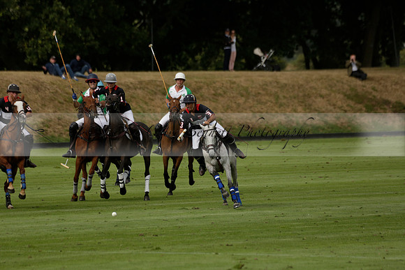 Jaeger Le Coultre (black)  v Wairakei Pastoral (white) in a Jaeger Le Coultre Holden White Cup polo match played on 29 July 2013 at Cowdray Park Polo Club on Brooksfieldwww.polopictures.co.uk