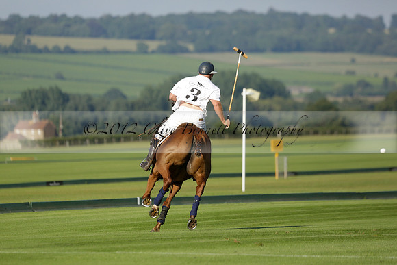 Pluma Negra (white) v Shoreline (black) in the Brecknock Cup Subsidiary final polo match played on Sunday 25 August 2013 at Cowdray Park Polo Club on Ambersham 1. 2013.10.12 www.polopictures.co.uk