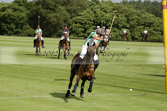 Jaeger Le Coultre (black)  v Wairakei Pastoral (white) in a Jaeger Le Coultre Holden White Cup polo match played on 29 July 2013 at Cowdray Park Polo Club on Brooksfieldwww.polopictures.co.uk