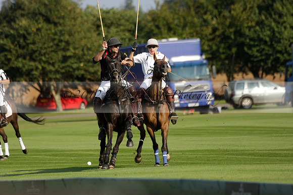 Pluma Negra (white) v Shoreline (black) in the Brecknock Cup Subsidiary final polo match played on Sunday 25 August 2013 at Cowdray Park Polo Club on Ambersham 1. 2013.10.12 www.polopictures.co.uk