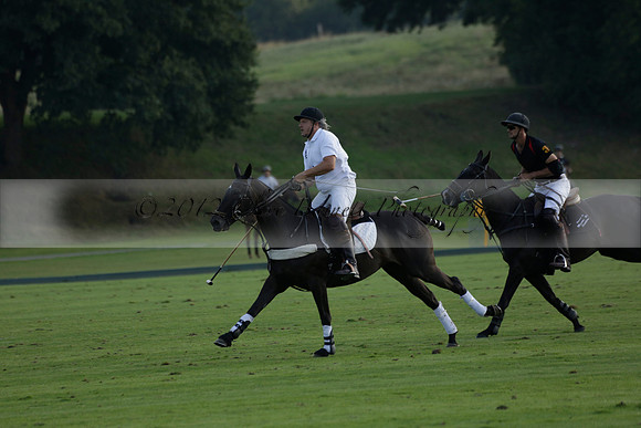 Pluma Negra (white) v Shoreline (black) in the Brecknock Cup Subsidiary final polo match played on Sunday 25 August 2013 at Cowdray Park Polo Club on Ambersham 1. 2013.10.12 www.polopictures.co.uk