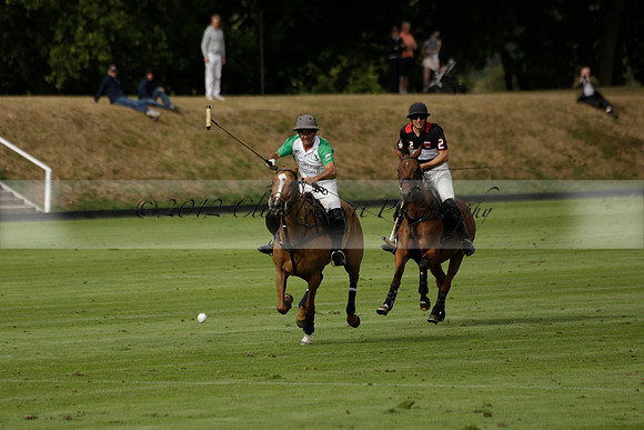 Jaeger Le Coultre (black)  v Wairakei Pastoral (white) in a Jaeger Le Coultre Holden White Cup polo match played on 29 July 2013 at Cowdray Park Polo Club on Brooksfieldwww.polopictures.co.uk