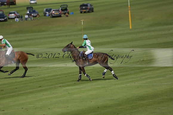 Jaeger Le Coultre (black)  v Wairakei Pastoral (white) in a Jaeger Le Coultre Holden White Cup polo match played on 29 July 2013 at Cowdray Park Polo Club on Brooksfieldwww.polopictures.co.uk