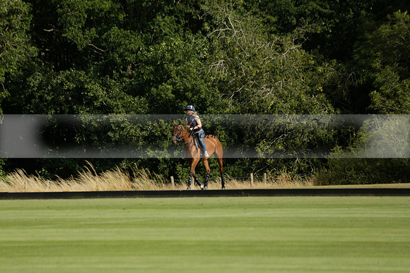 Jaeger Le Coultre (black)  v Wairakei Pastoral (white) in a Jaeger Le Coultre Holden White Cup polo match played on 29 July 2013 at Cowdray Park Polo Club on Brooksfieldwww.polopictures.co.uk