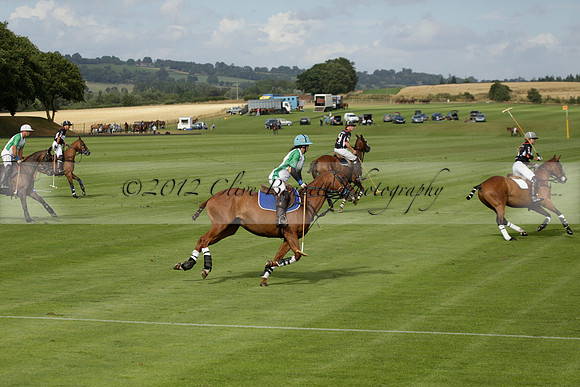 Jaeger Le Coultre (black)  v Wairakei Pastoral (white) in a Jaeger Le Coultre Holden White Cup polo match played on 29 July 2013 at Cowdray Park Polo Club on Brooksfieldwww.polopictures.co.uk