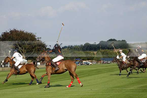 Pluma Negra (white) v Shoreline (black) in the Brecknock Cup Subsidiary final polo match played on Sunday 25 August 2013 at Cowdray Park Polo Club on Ambersham 1. 2013.10.12 www.polopictures.co.uk