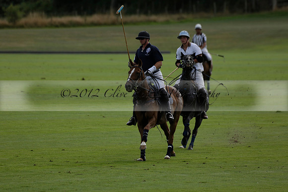 Pandas (white) v Home Farm (navy) in a Park House West Sussex Cup Polo match on Brooksfield at Cowdray Park Polo Club on Friday 30 August 2013. 2013.08.30 www.polopictures.co.uk