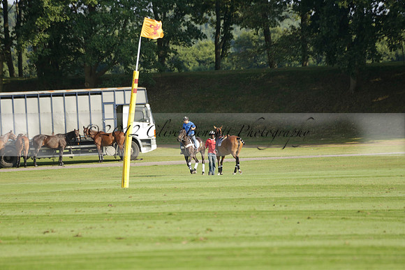 Pluma Negra (white) v Shoreline (black) in the Brecknock Cup Subsidiary final polo match played on Sunday 25 August 2013 at Cowdray Park Polo Club on Ambersham 1. 2013.10.12 www.polopictures.co.uk