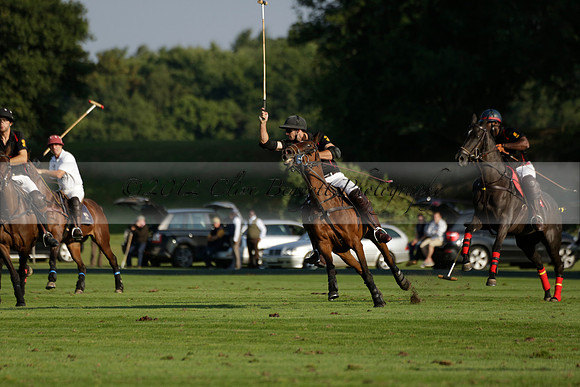 Pluma Negra (white) v Shoreline (black) in the Brecknock Cup Subsidiary final polo match played on Sunday 25 August 2013 at Cowdray Park Polo Club on Ambersham 1. 2013.10.12 www.polopictures.co.uk