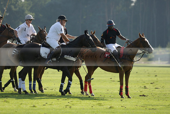 Pluma Negra (white) v Shoreline (black) in the Brecknock Cup Subsidiary final polo match played on Sunday 25 August 2013 at Cowdray Park Polo Club on Ambersham 1. 2013.10.12 www.polopictures.co.uk