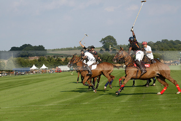 Pluma Negra (white) v Shoreline (black) in the Brecknock Cup Subsidiary final polo match played on Sunday 25 August 2013 at Cowdray Park Polo Club on Ambersham 1. 2013.10.12 www.polopictures.co.uk